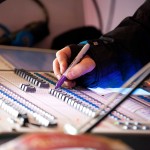 Pictured above is a close up detail of our lighting technician making design notes for the show directly on the mixing desk.